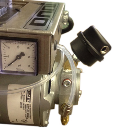 Omni waste (used) oil burner: on-board air compressor pressure gauge and air filter.